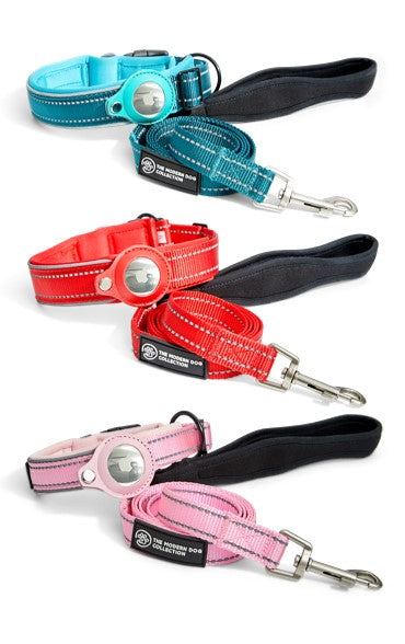 Big Apple airtag collars and leash sets displayed in all colors, blue, red and pink.